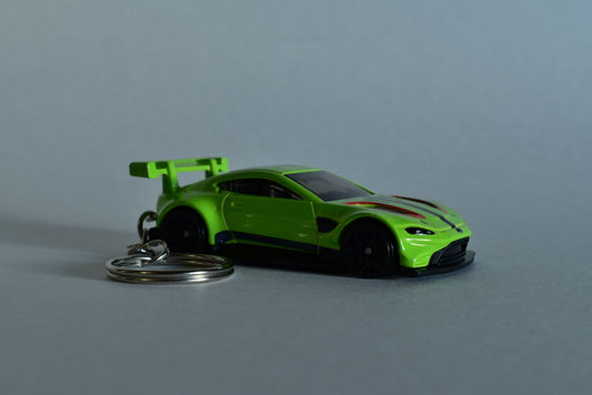 Hotwheels Aston Martin Vantage GTE in green on a white background