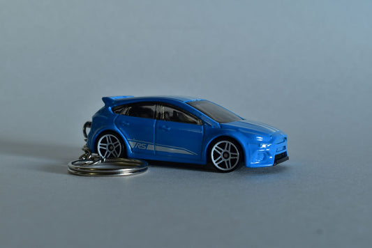 Blue Ford Focus Hotwheels on a white background