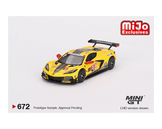 Mini GT Chevrolet Corvette IMSA GTD PRO yellow livery on white background showing the front of the car.