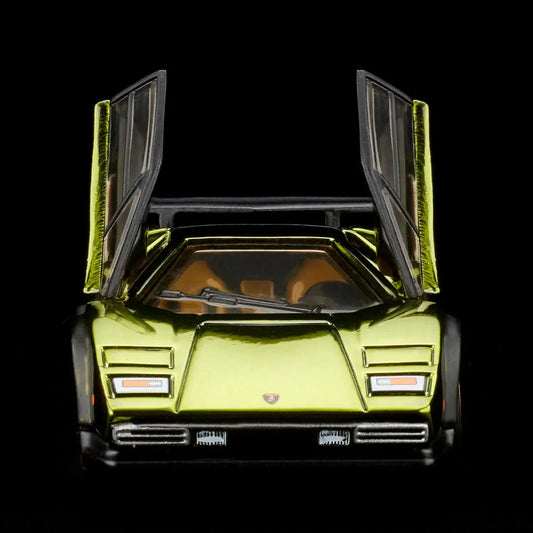 A front view of the Hotwheels RLC Lamborghini Countach Olive Green on black background with scissor doors open